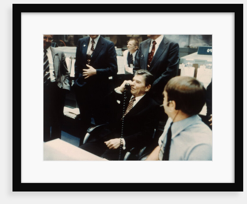 President Ronald Reagan speaks to astronauts on the Space Shuttle, 1981 by NASA
