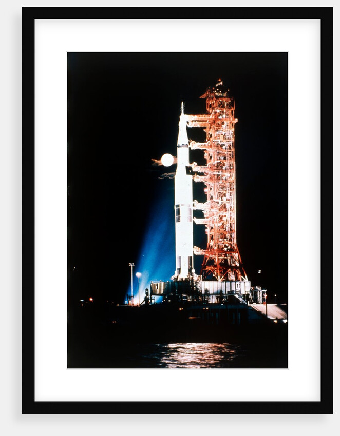 Apollo 9 Saturn V rocket with full moon, 1969 by NASA