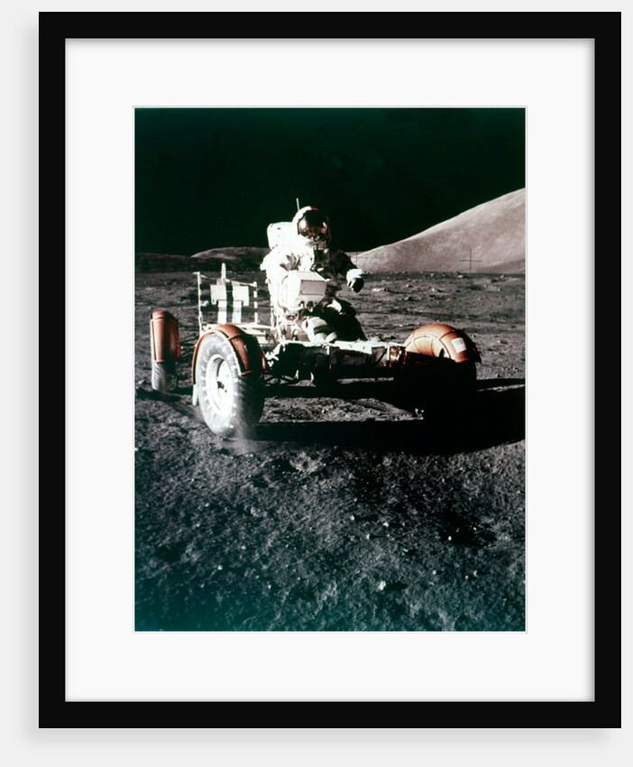 Eugene Cernan using the Rover on the lunar surface, Apollo 17 mission, December 1972 by NASA