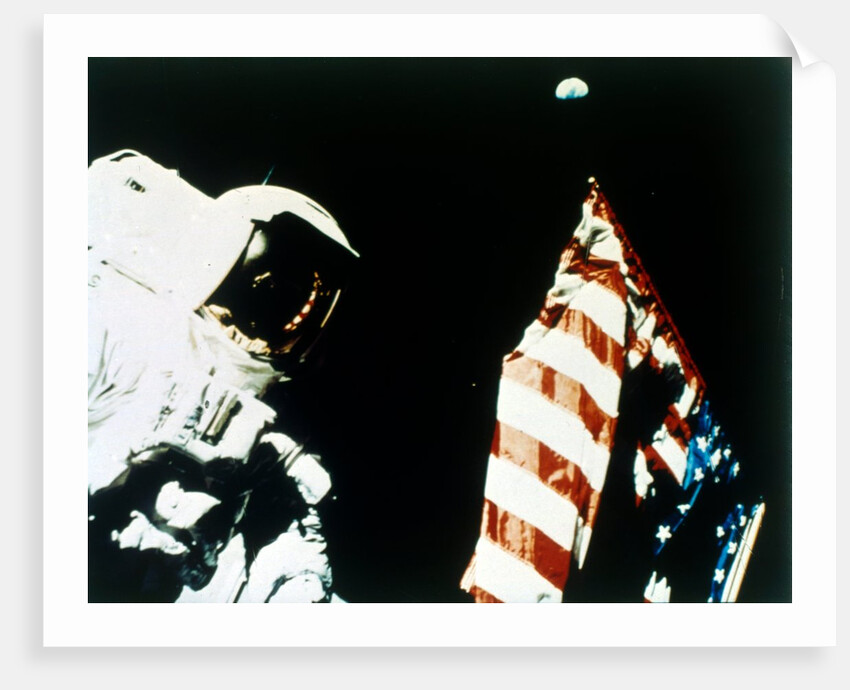 Harrison Schmitt with US flag on the surface of the Moon, Apollo 17 mission, December 1972 by NASA