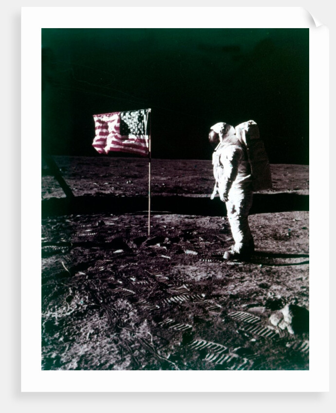Buzz Aldrin stands next to the American flag on the surface of the Moon, July 1969 by Neil Armstrong