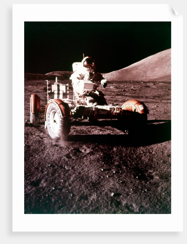 Eugene Cernan using the Rover on the lunar surface, Apollo 17 mission, December 1972 by NASA