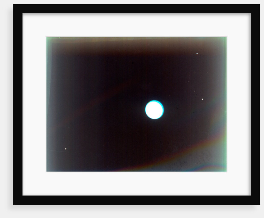 Uranus with satellites Miranda, Ariel and Umbriel, from Voyager 2, 24 January 1986 by NASA