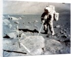 Harrison Schmitt works the scoop on the lunar surface, Apollo 17 mission, December 1972 by NASA