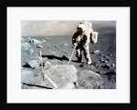 Harrison Schmitt works the scoop on the lunar surface, Apollo 17 mission, December 1972 by NASA