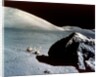 The Rover is dwarfed by a giant rock on the lunar surface, Apollo 17 mission, December 1972 by NASA
