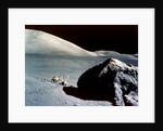 The Rover is dwarfed by a giant rock on the lunar surface, Apollo 17 mission, December 1972 by NASA