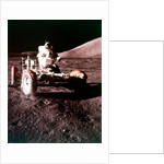 Eugene Cernan using the Rover on the lunar surface, Apollo 17 mission, December 1972 by NASA
