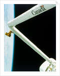 Manipulator arm deployed during the second Space Shuttle flight, November 1981 by NASA