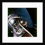 Module pilot David Scott emerging from Apollo 9 spacecraft, 6 March 1969 by Russell Schweickart