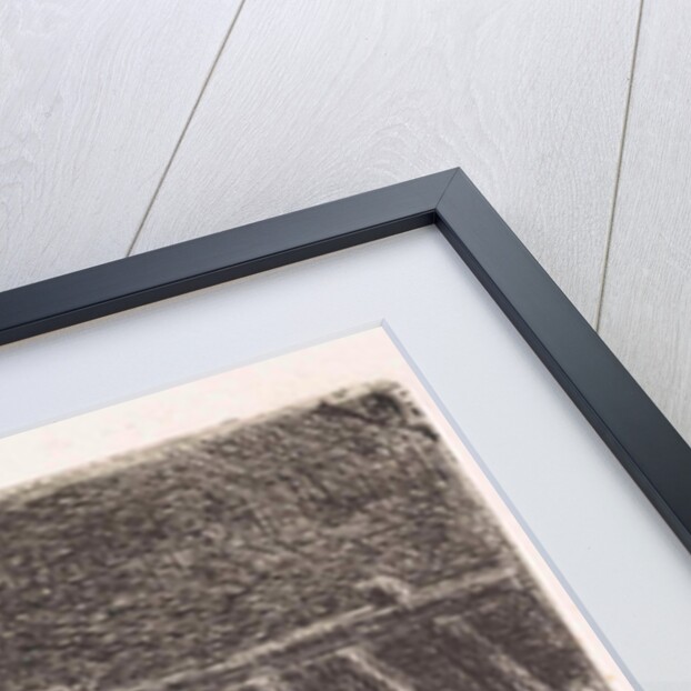 Farmer between two cows in a manger in a stable (small version) by Jan Vrolijk