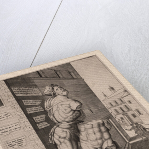 The statue Pasquino, standing on a pedestal in the Piazza di Pasquino in Rome, Italy by Antonio Lafreri