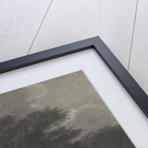 Village with wooden houses by a river by Lambertus Antonius Claessens