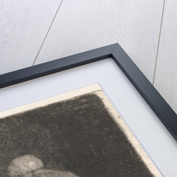 Woman looking in a crib by Bernardus Johannes Blommers