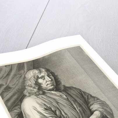 Portrait of Petrus van Staveren, pastor of Leiden The Netherlands, his hand resting on a Bible by Johannes Willemsz. Munnickhuysen