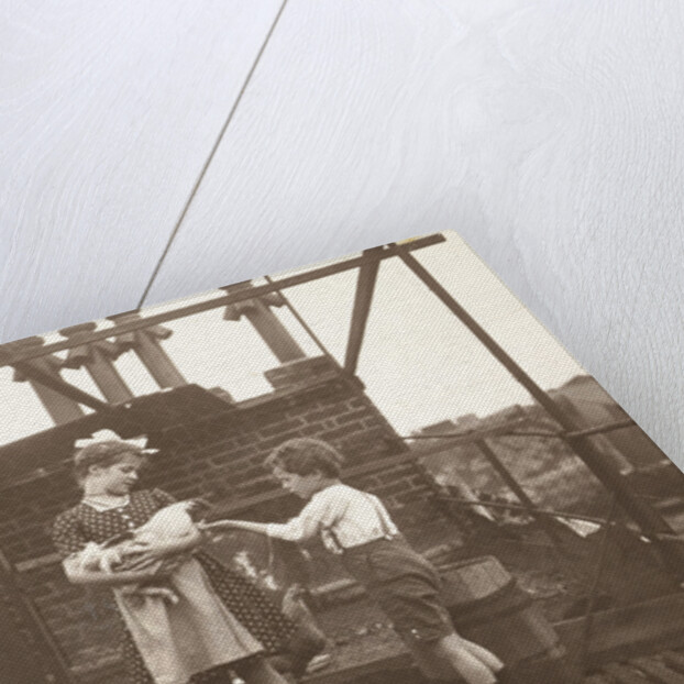 Marba (?) And Eckart Titzenthaler, children of the photographer, on the roof of the house Friedrichstrasse, Berlin, with a cock, Germany by Waldemar Titzenthaler