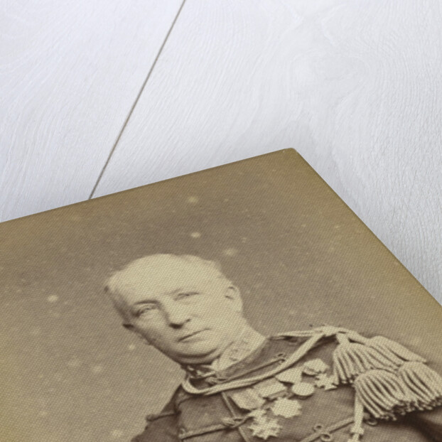 Studio Portrait of a man in military uniform by Woodbury & Page