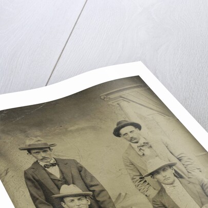 Portrait of four men sitting and standing in front of a painted backdrop, architecture by Anonymous