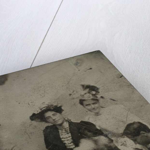 Portrait of a man who is kneeling in three women and two of them holding a hand by Anonymous