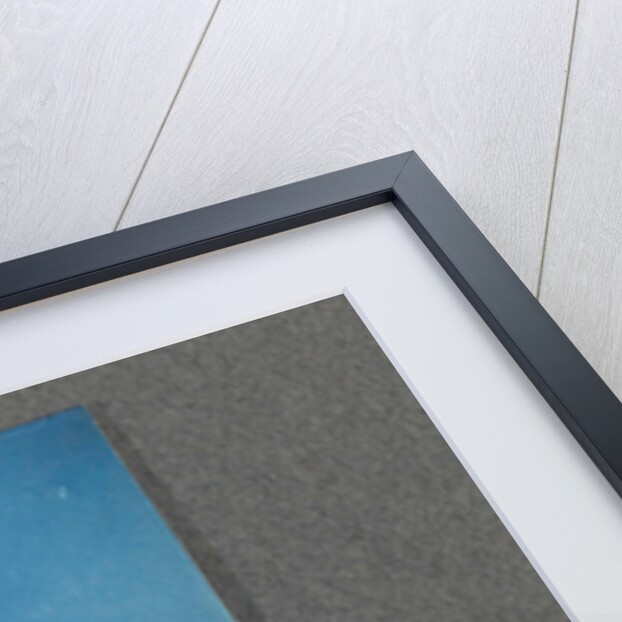 Boy sitting on wooden planks, USA by Anonymous