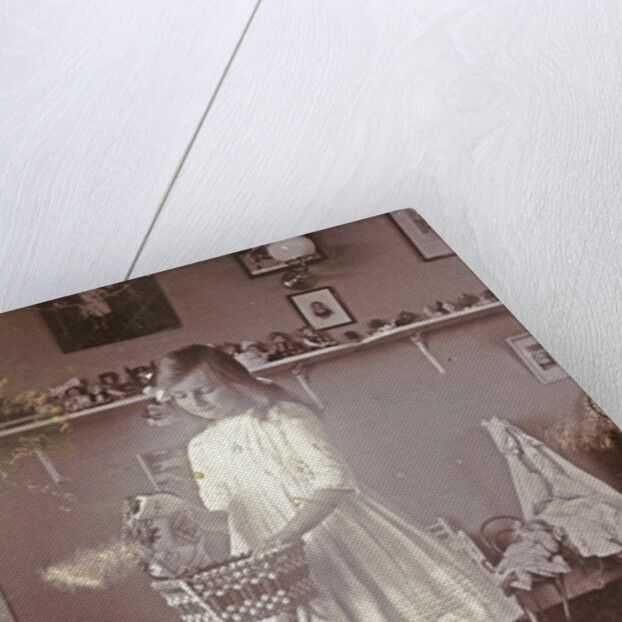 Portrait of Sacha, the eldest daughter of the photographer, in a room with toys by Henry Pauw van Wieldrecht