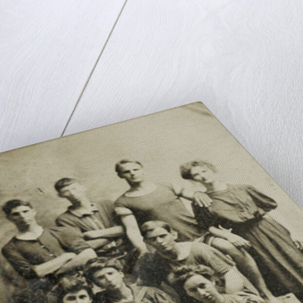 Group portrait of five men and five women (partly) in swimwear, standing and sitting in a studio setting by Anonymous