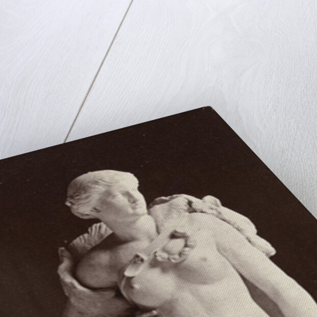 Marble statue of a woman with bare breasts and in her hand a baton by Louis-Emile Durandelle