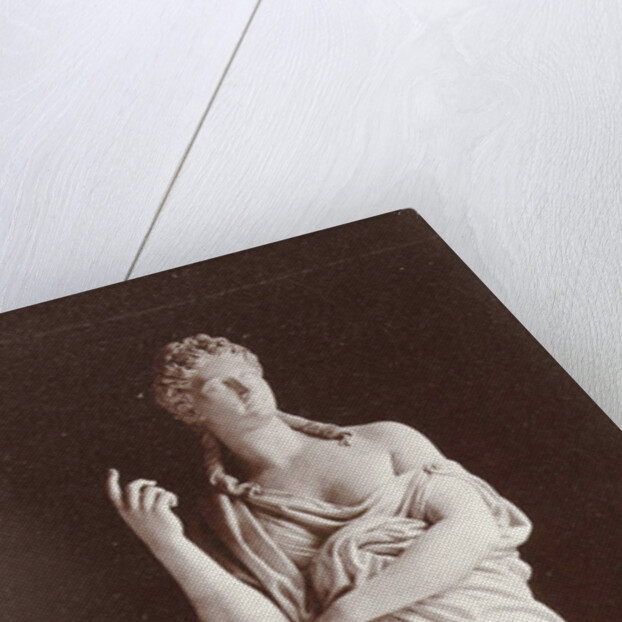 Marble statue of a woman wearing a toga by Louis-Emile Durandelle