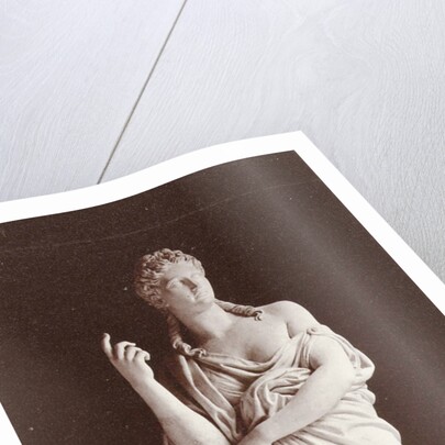 Marble statue of a woman wearing a toga by Louis-Emile Durandelle