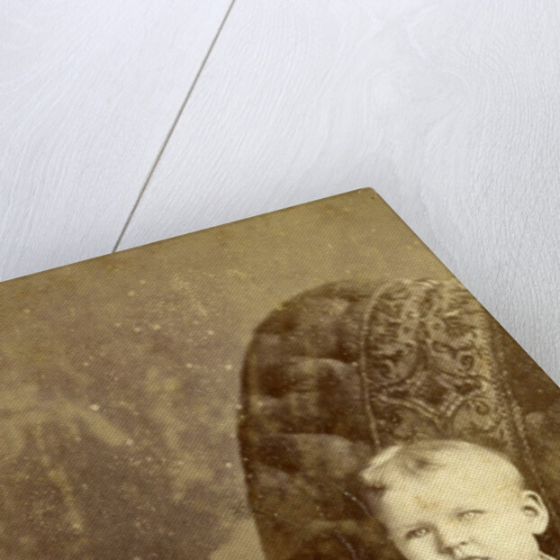 Portrait of a baby on a chair by Kameke