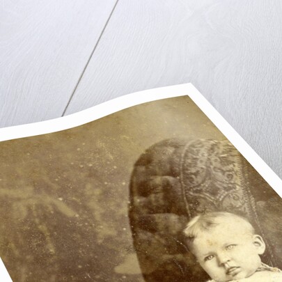 Portrait of a baby on a chair by Kameke