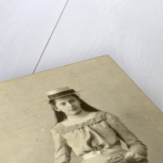 Portrait of young woman in dress with ladies bike by Alex van Dijck