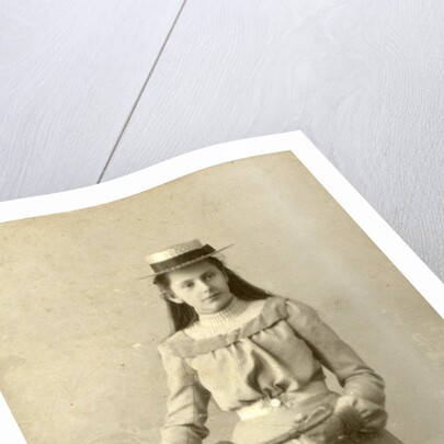 Portrait of young woman in dress with ladies bike by Alex van Dijck