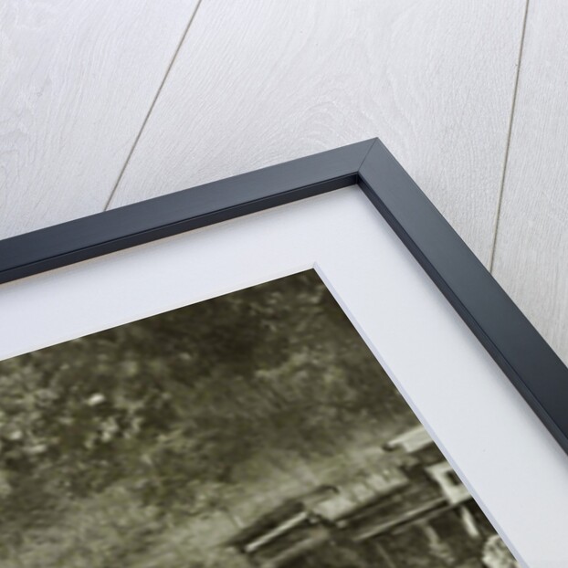 shops or stalls on the banks of a water by Anonymous