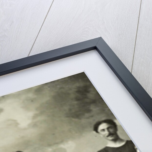 Group portrait of five men, three women and a girl in swimwear for a painted background with a cloudy sky by Christoph Martin Wieland