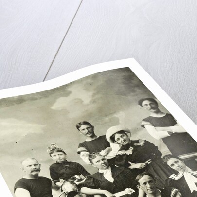 Group portrait of five men, three women and a girl in swimwear for a painted background with a cloudy sky by Christoph Martin Wieland