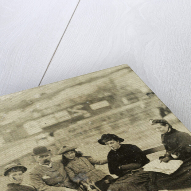 Three women, a man and a girl on the beach by Anonymous