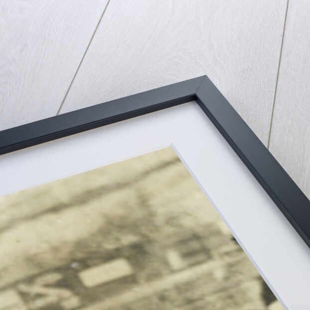 Three women, a man and a girl on the beach by Anonymous