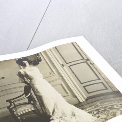 Unidentified woman standing in an interior by Anonymous