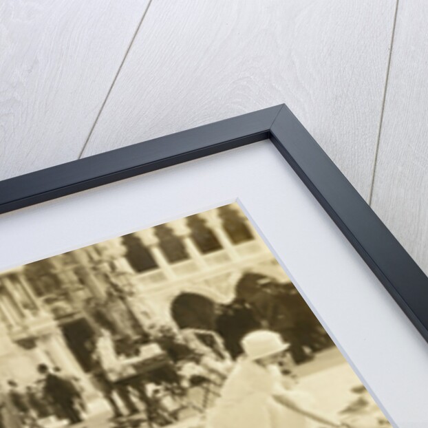 American tourists wearing pigeons in Piazza San Marco, Venice, Italy by Anonymous