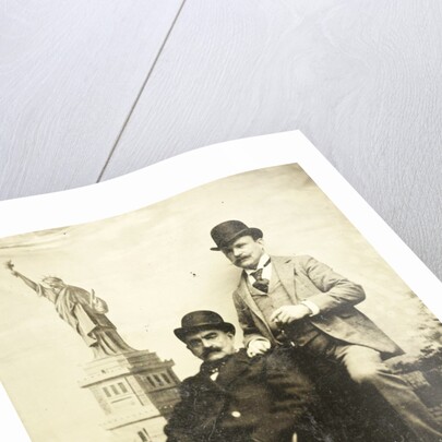 Portrait of two men for a painted backdrop with the Statue of Liberty in New York, USA by Anonymous