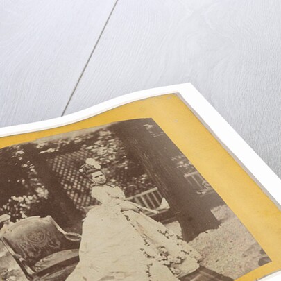 Portrait of a woman in costume in garden by Anonymous