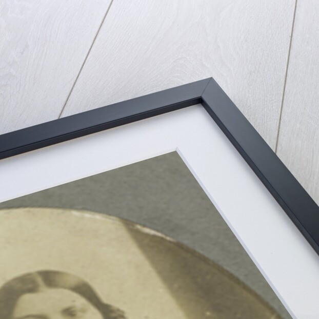 Portrait of a Young Woman with an elbow leaning on table by Eduard Isaac Asser