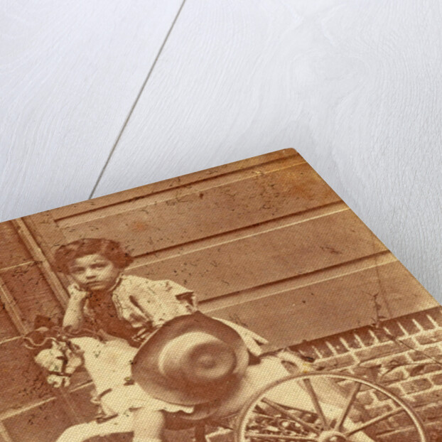 Louis Asser, son of the photographer, on a tricycle by Eduard Isaac Asser