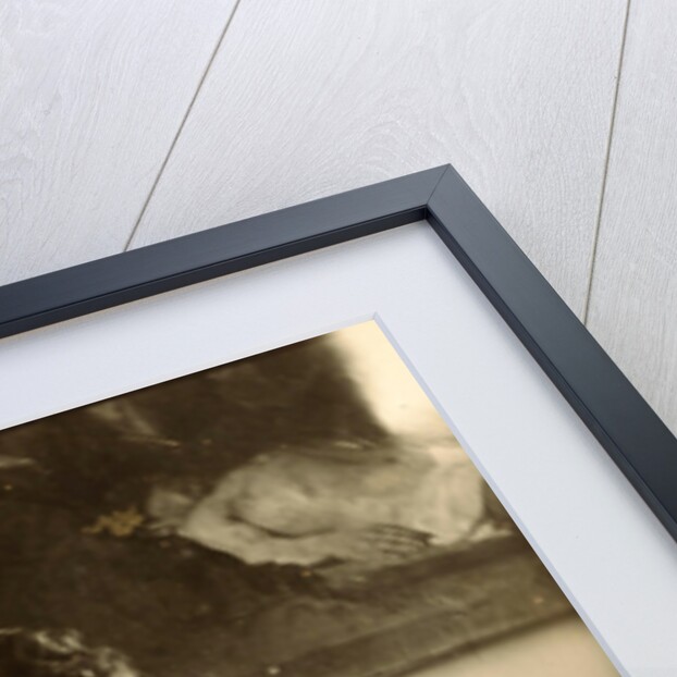 Marie Jordan dressed sitting in bed with a cup in her hands by George Hendrik Breitner