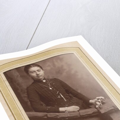 Portrait of a young woman in a dress with a necklace by A. Böeseken