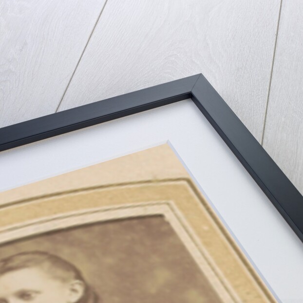 Portrait of a Young Woman in a dress leaning on a chair by De Lavieter & Co.