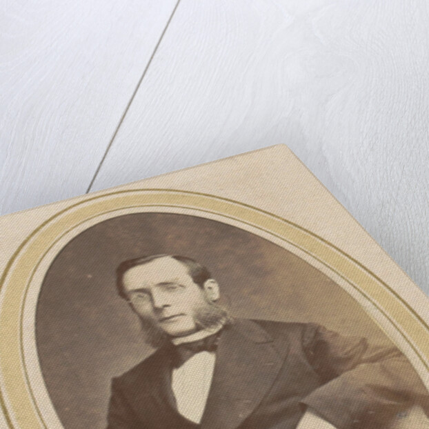 Portrait of a man with glasses by sideburns and a jacket