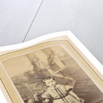 Portrait of a little girl in a dress with a toy horse by Franz Wilhelm Deutmann