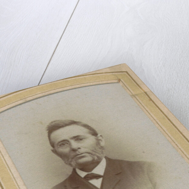 Portrait of a man with glasses and sideburns by J.C. Reesinck